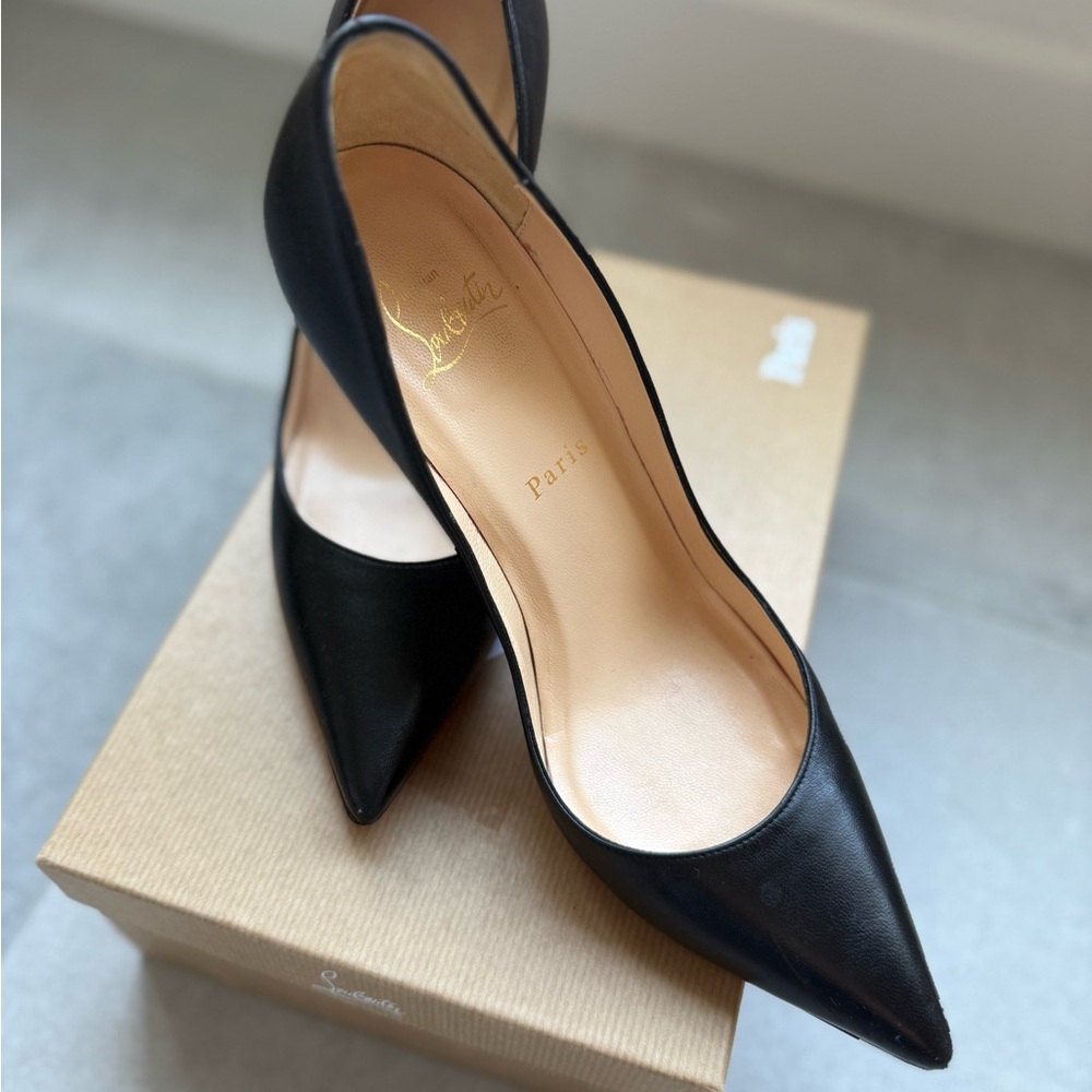 Christian Louboutin - Black High Heels with Pointed Toe and Sleek Design